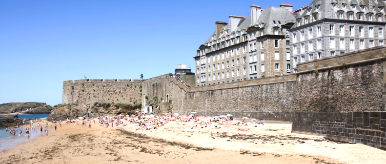 St Malo's beach is overlooked by its dramatic walled Old City