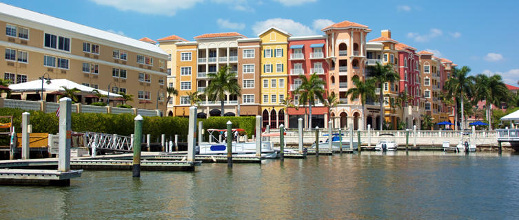 Tropical coloured buildings at the marina in Naples, Florida