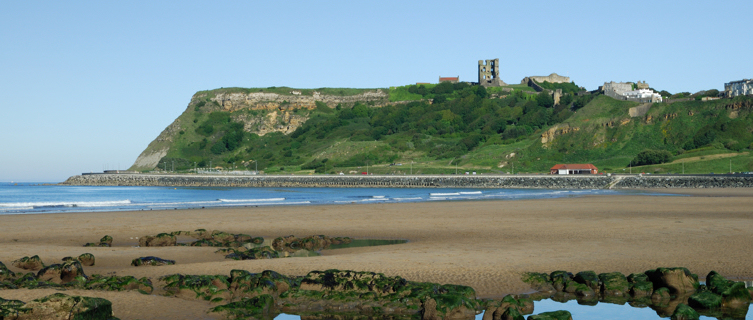 Scarborough's two golden beaches are divided by a castle