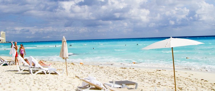 Take a dip in Cancún's milky blue sea