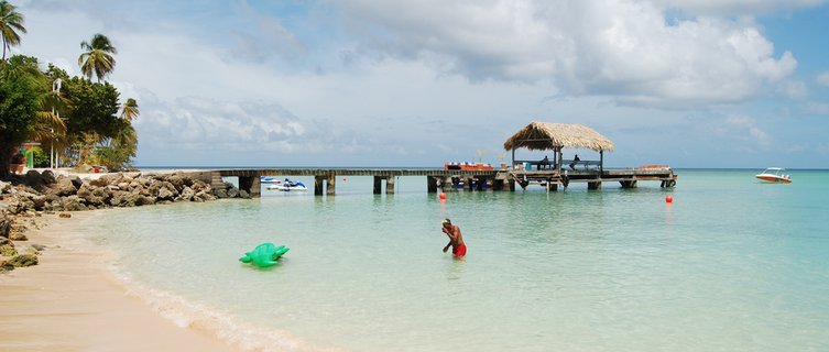 Tobago's beaches boast tranquil waters and glitzy hotels