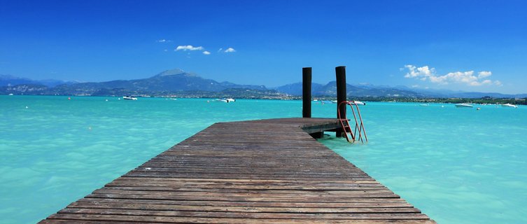 Gaze out from a jetty on Lake Garda
