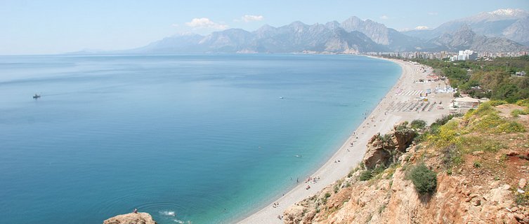 Relax on the golden sand and take in the spectacular scenery at the beautiful Konyaalti Beach