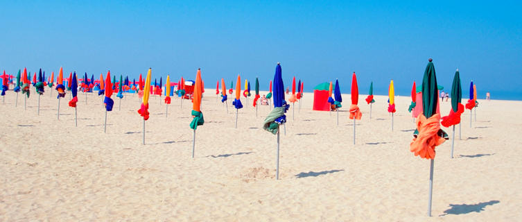 Colourful parasols line Deauville's beaches