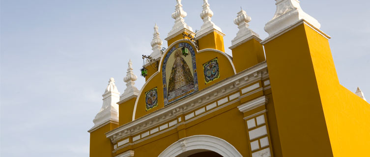 Painted yellow church in Seville.
