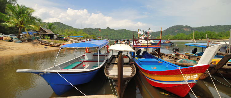 Coloured boats docked in one of Langkawi's beaches