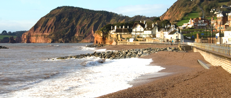 Fringed by russet-coloured cliffs, Sidmouth's beach offers a tranquil getaway